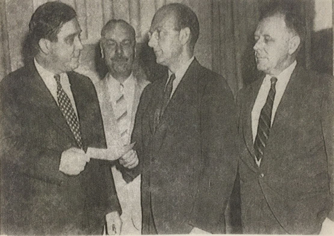 Willkie, as president of Commonwealth and Southerm, receives a check from TVA aministrator David E. Lilienthal for the purchase of the Tennessee Electric Power Company. Image courtesy of Indiana State Library.
