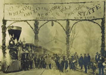 The first Atlantic and Great Western train arrives in Kent, Ohio, 1863